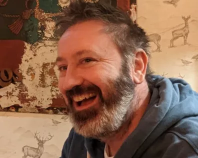 Dr. Ben Pascoe smiling at the camera.